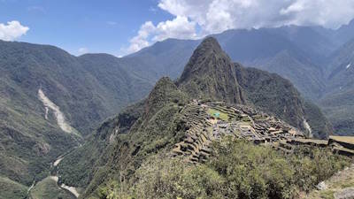 Visiting Machu Picchu.